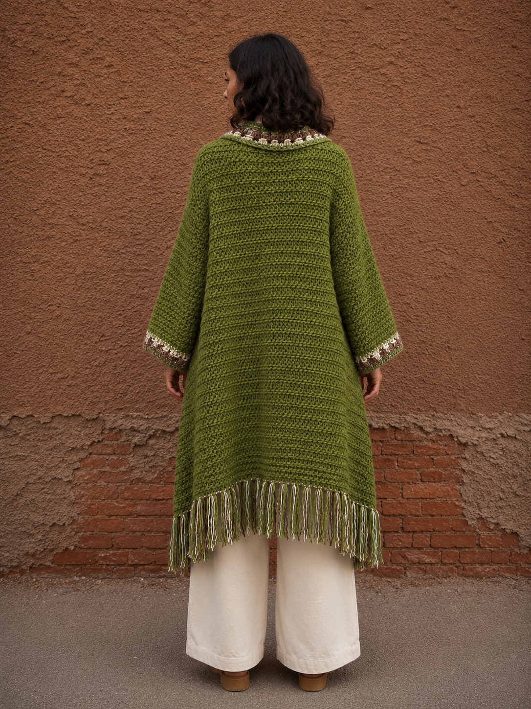 Saco largo tejido verde con flecos