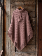 Poncho rosa viejo con flecos