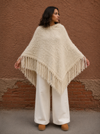Poncho crudo con flecos