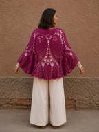 Poncho tejido crochet fucsia