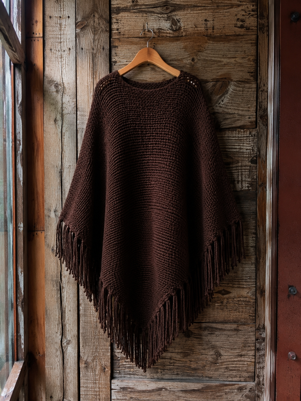Poncho chocolate con flecos